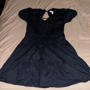 Cute black dress. Wore once for an event, has cinched sleeves